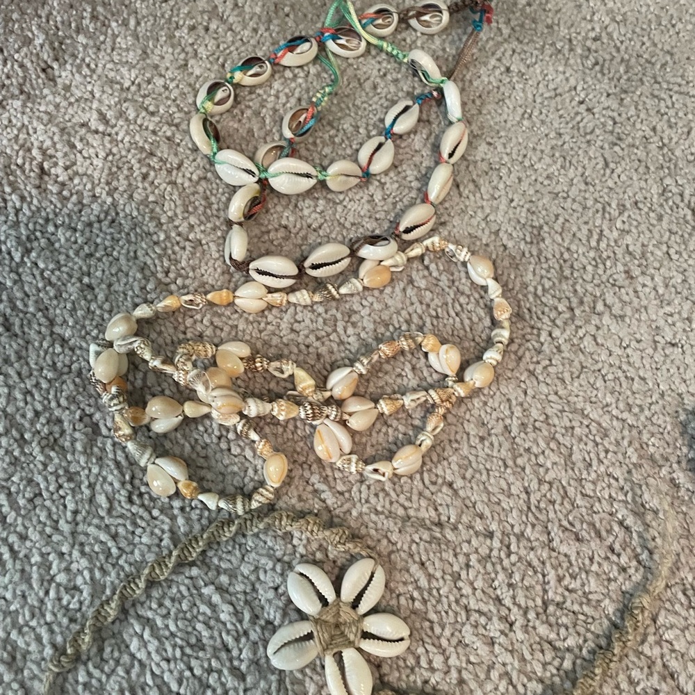 Bundle of shell jewelry, necklace and ring